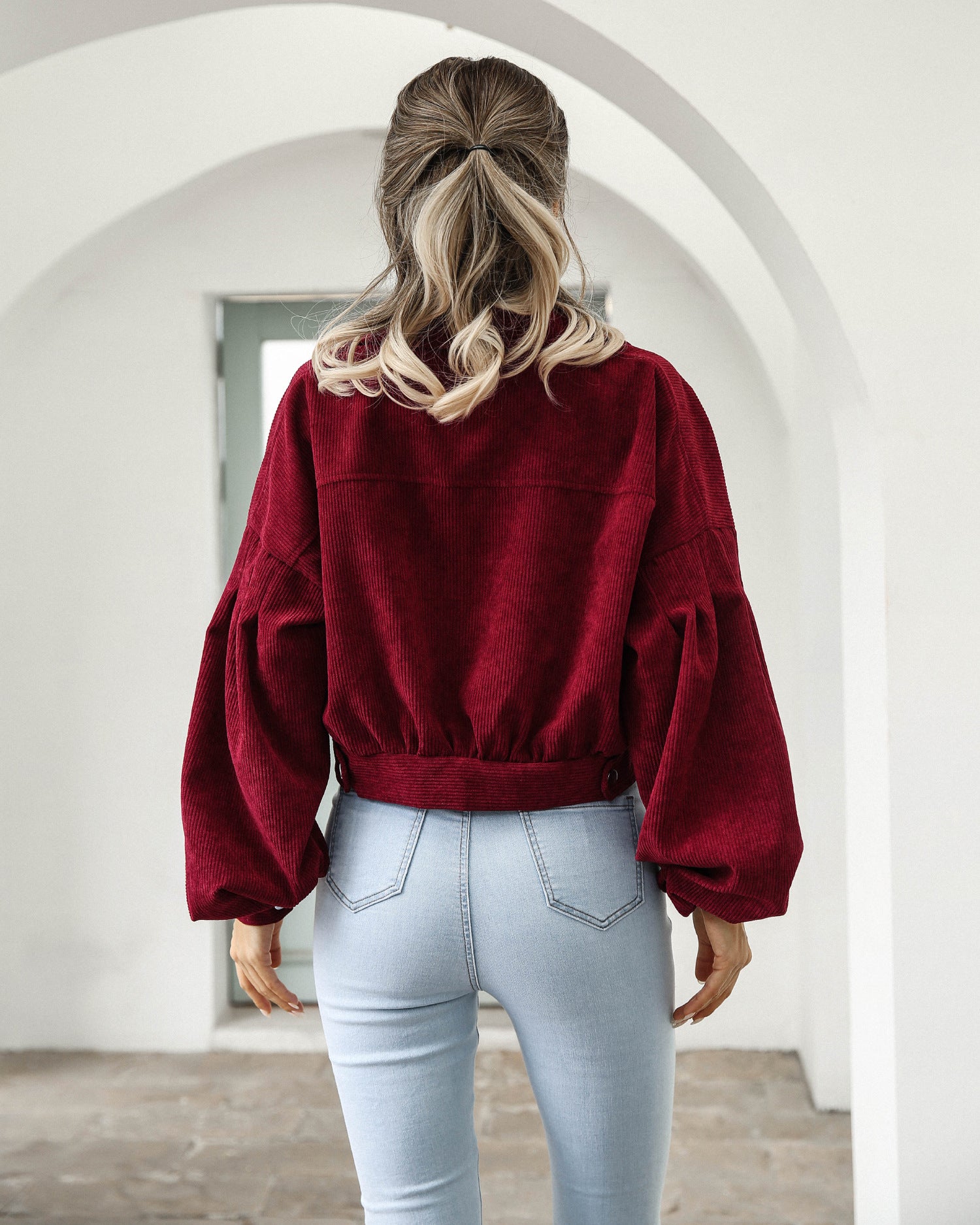 Back view of cropped corduroy jacket