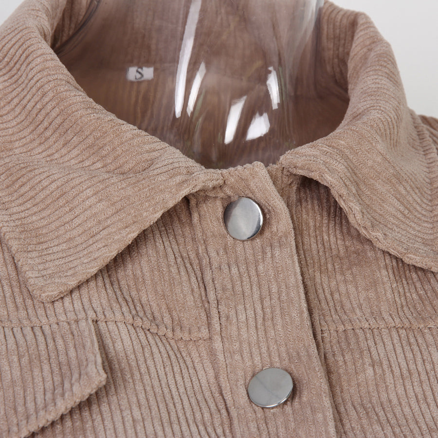Corduroy collar and metal button detail